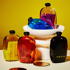 Coloured bubble glass vessels containing matchsticks, Luxury Boutique Gifts Under £30 image