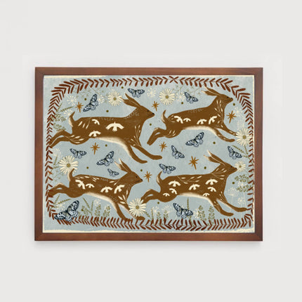 Running Hares in Spring print on pale blue background
