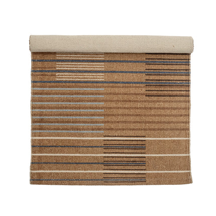 Jute lined cotton rug in natural tones