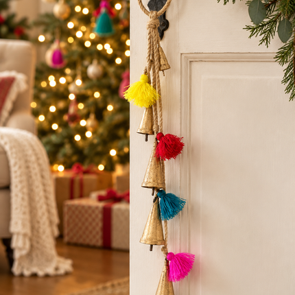 Fiona Walker Christmas bell and multicolour tassel hanging decoration styled on a door handle