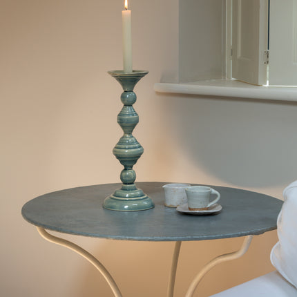 Tall glazed ceramic candlestick holder in pale sage